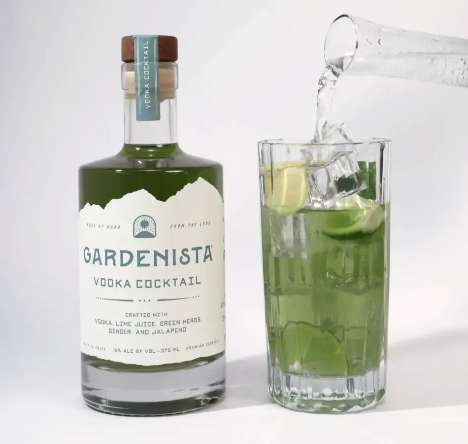 Gardenista Vodka Cocktail Being Poured Into A Glass